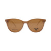 Clear peach oval clip-on optical glasses with a lightweight full-rim frame and detachable black magnetic sunglass lenses displayed in front.